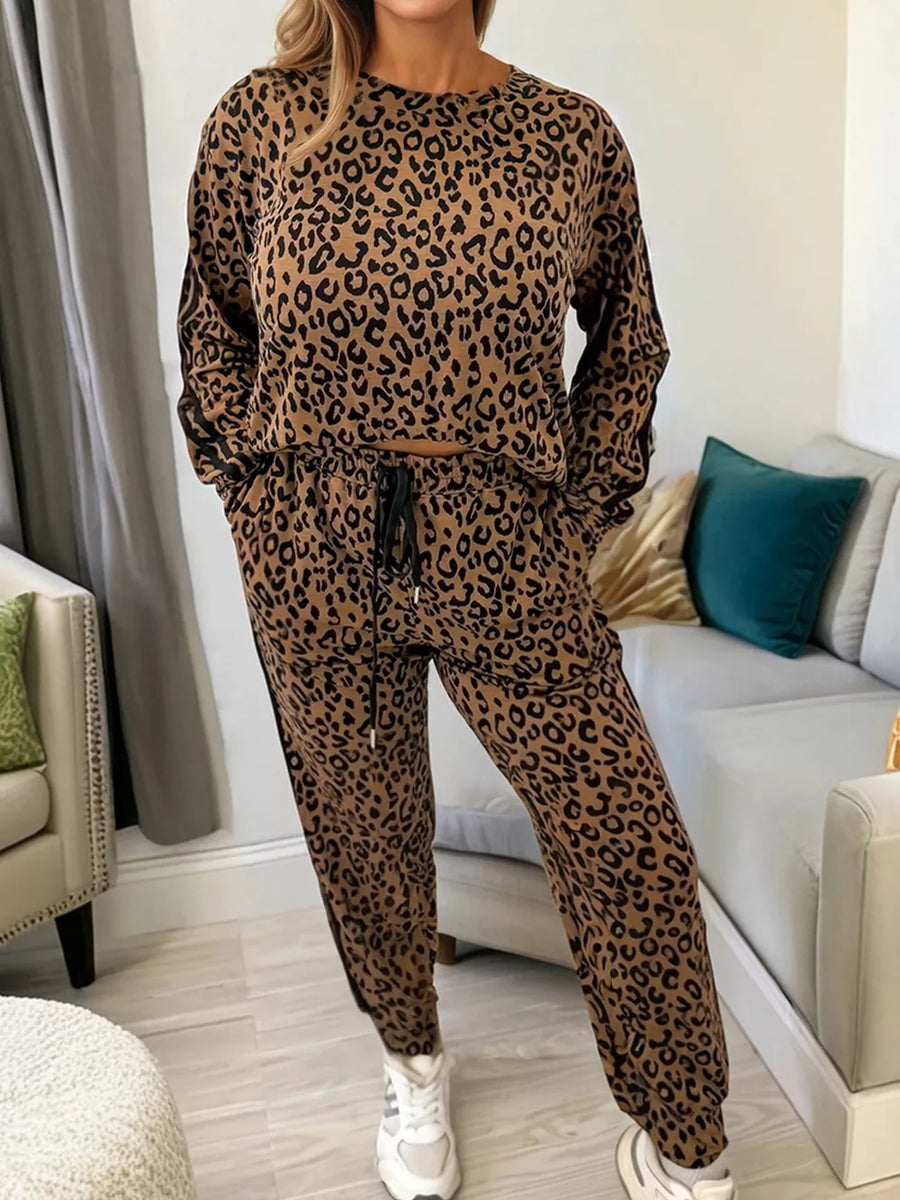 Leopard print loungewear set with drawstring joggers and long sleeve top.