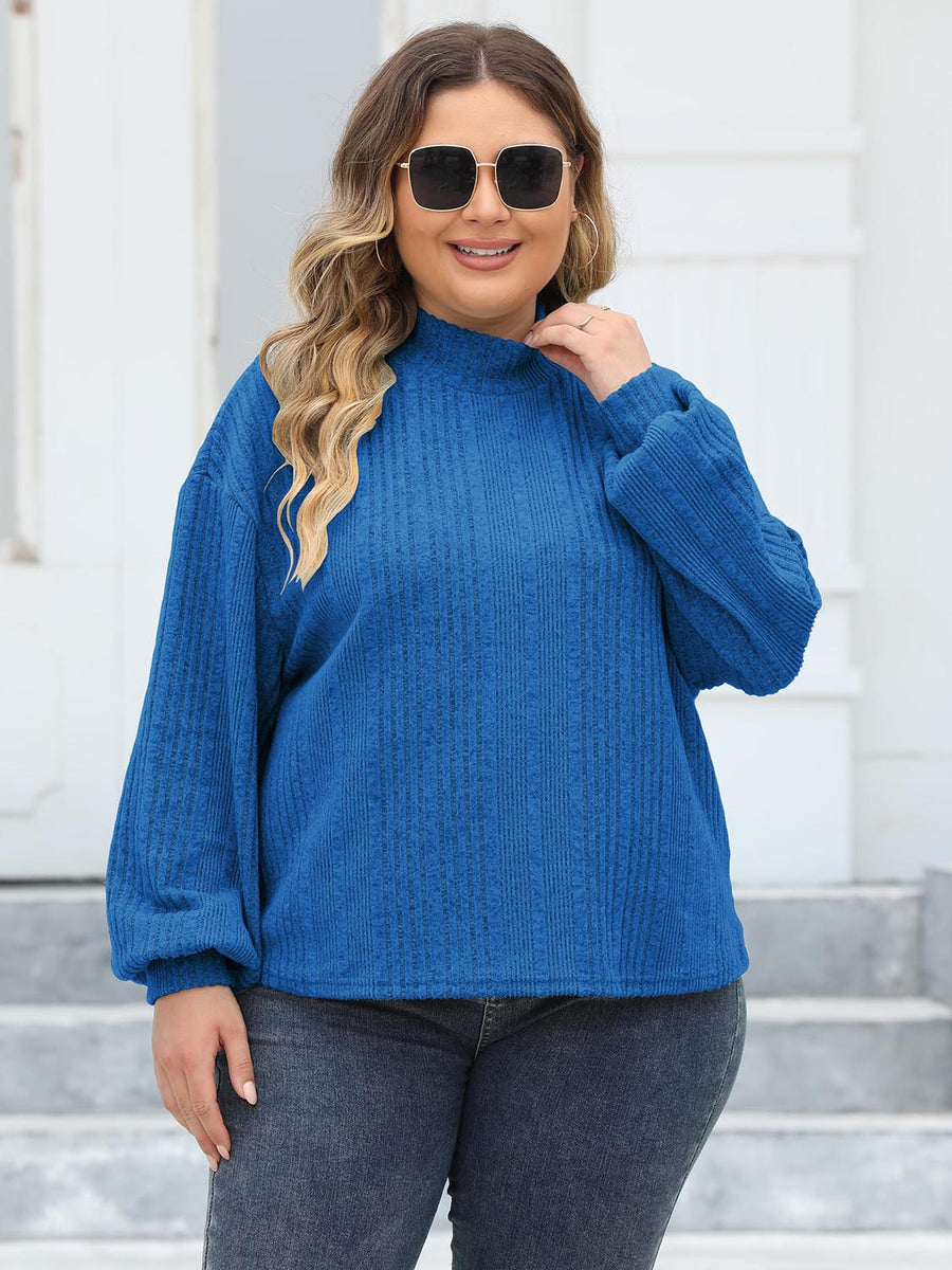 Textured balloon sleeve mock neck sweater in Royal Blue with ribbed detail.
