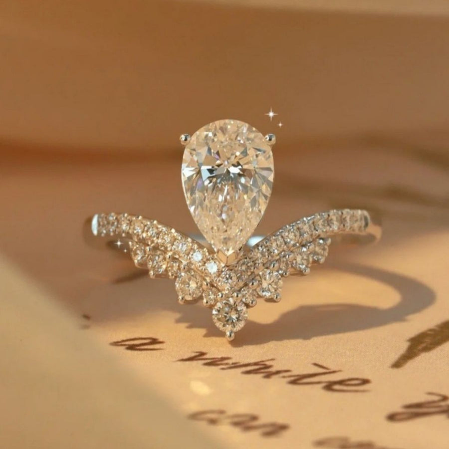 clear V-shaped band with pear-cut stone ring with not applicable