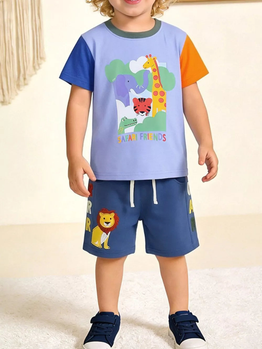 Toddler color block t-shirt and shorts set with safari animal print and "Safari Friends" text.