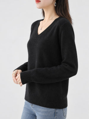 Nylon and viscose blend v-neck sweater in ivory with relaxed silhouette