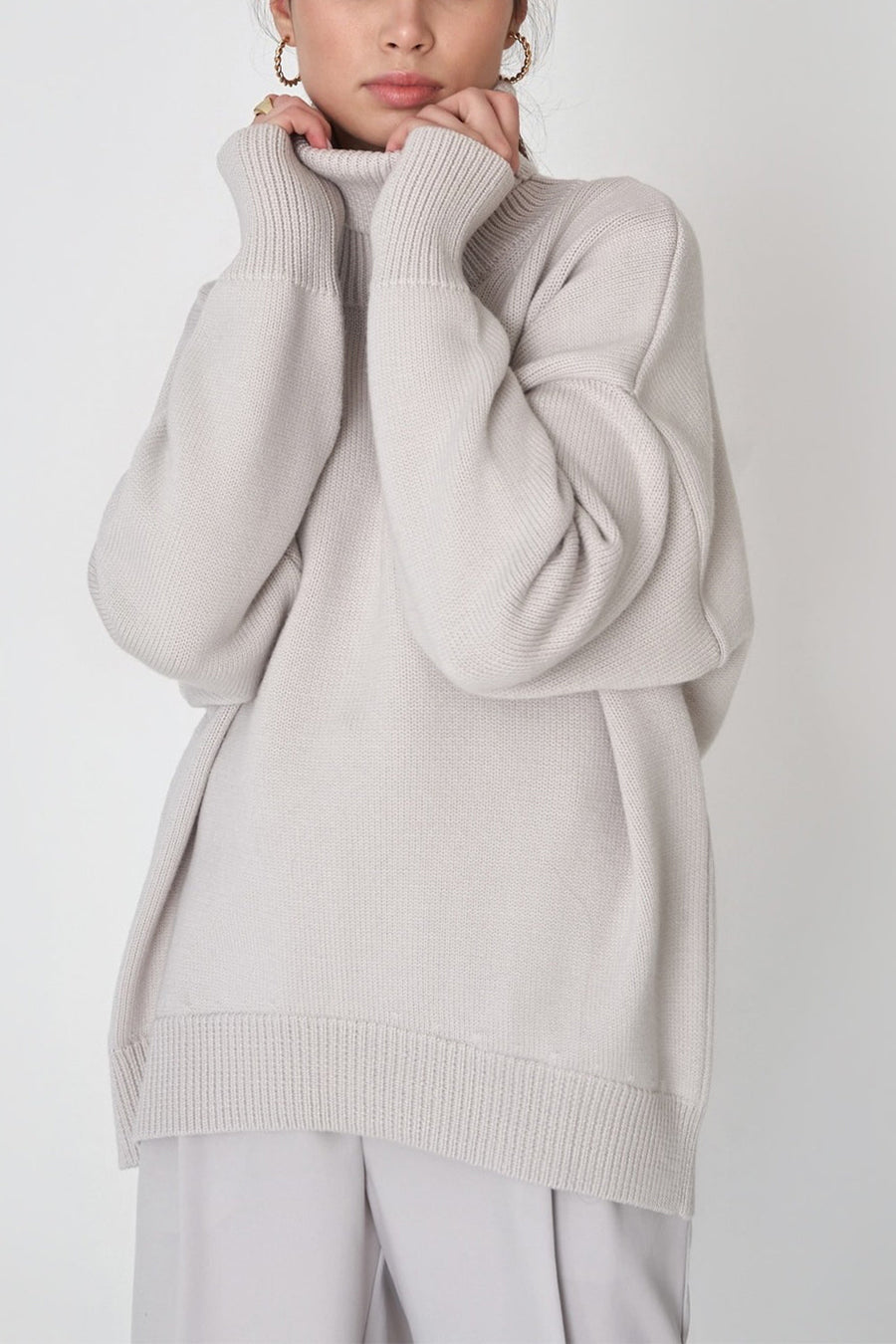 Light Gray Relaxed Roll-Neck Boxy Knit Sweater with ribbed cuffs and hem.