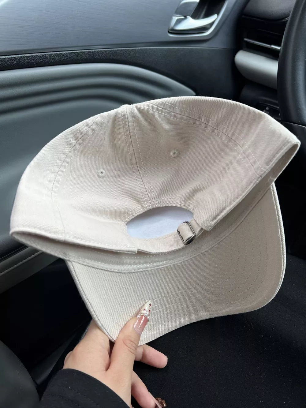 Khaki cotton baseball cap with adjustable strap detail