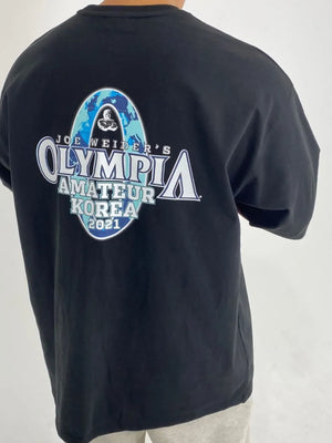 Black oversized t-shirt with Olympia Amateur Korea 2021 graphic print on back