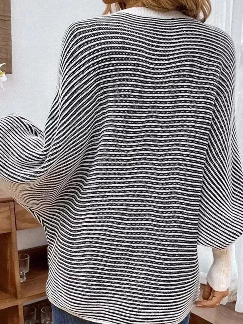 v-neck sweater in Black with striped and ribbed