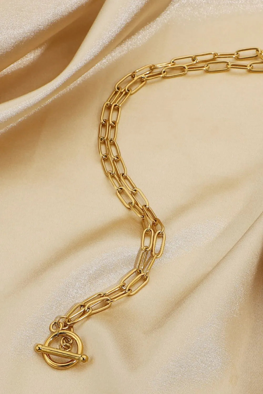 Gold-tone paperclip chain necklace with toggle clasp