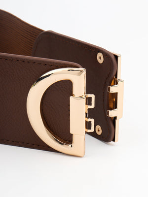 Brown elastic belt with double D gold buckle and gold hardware detail