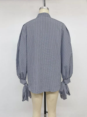 button-up shirt in navy blue with collared and long sleeve