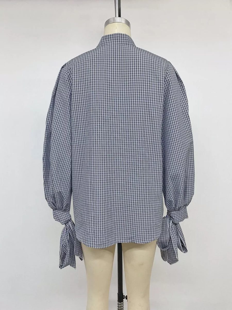 button-up shirt in navy blue with collared and long sleeve