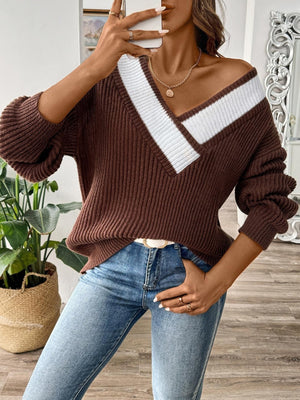 Black v-neck sweater with hip-length and pullover