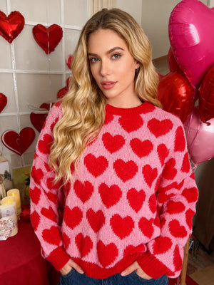 baby pink pullover sweater with heart-print and crew neck