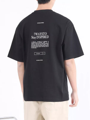 Black cotton blend crew neck t-shirt with white graphic text and logo on back.