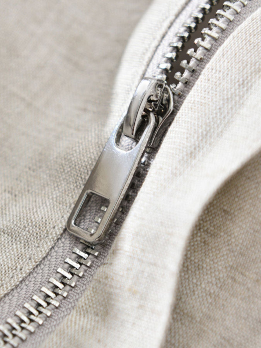 Beige bomber jacket with hip-length and zip-front