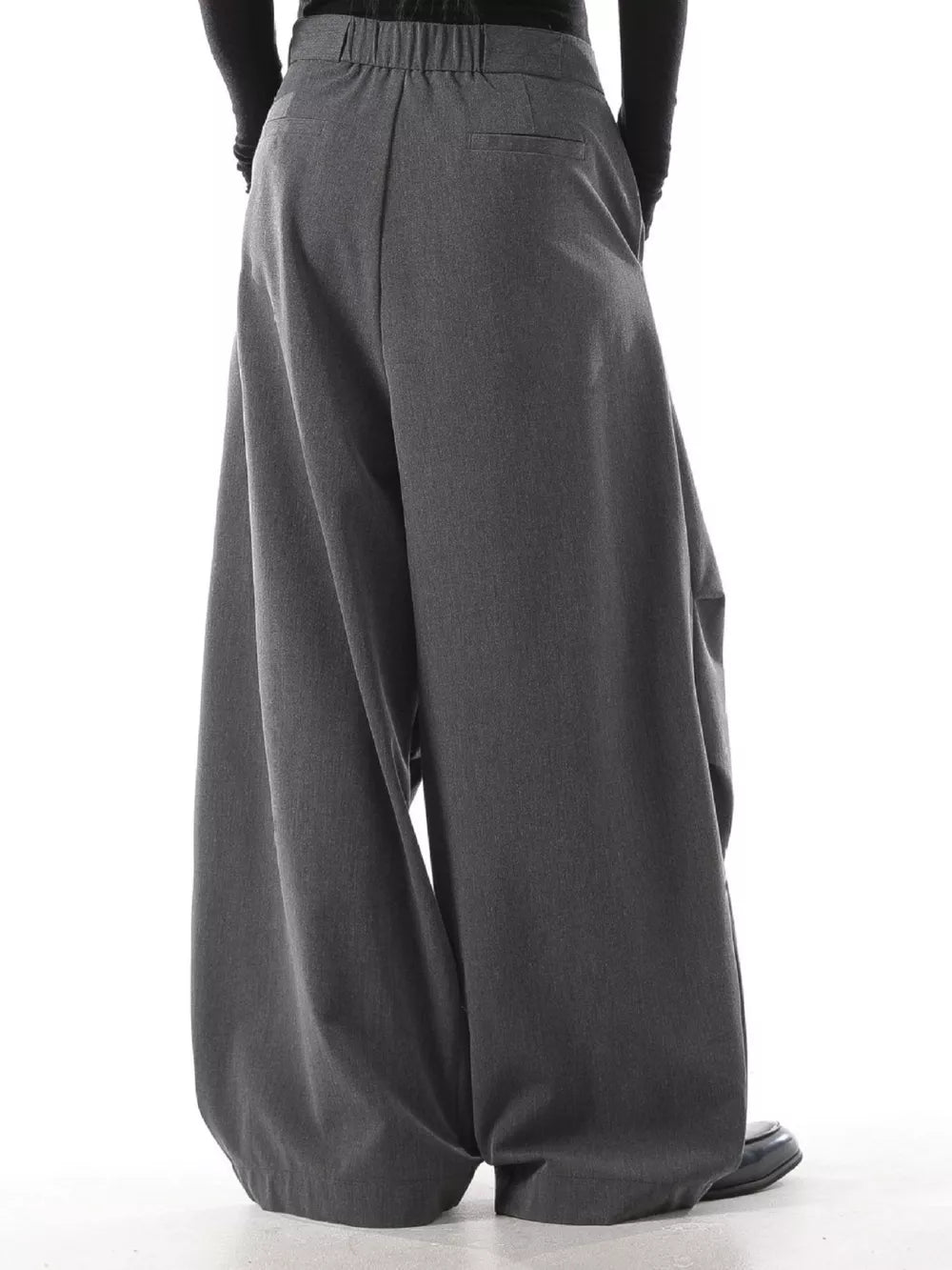 Men's grey casual wide leg sweatpants with drawstring waist and pockets.