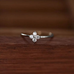 ring in clear with four-leaf clover and zircon embellishment