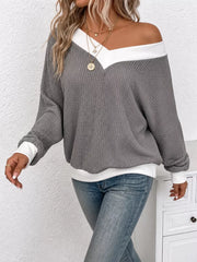 95% polyester, 5% elastane Care instructions: Machine wash cold v-neck sweater in Gray with relaxed silhouette