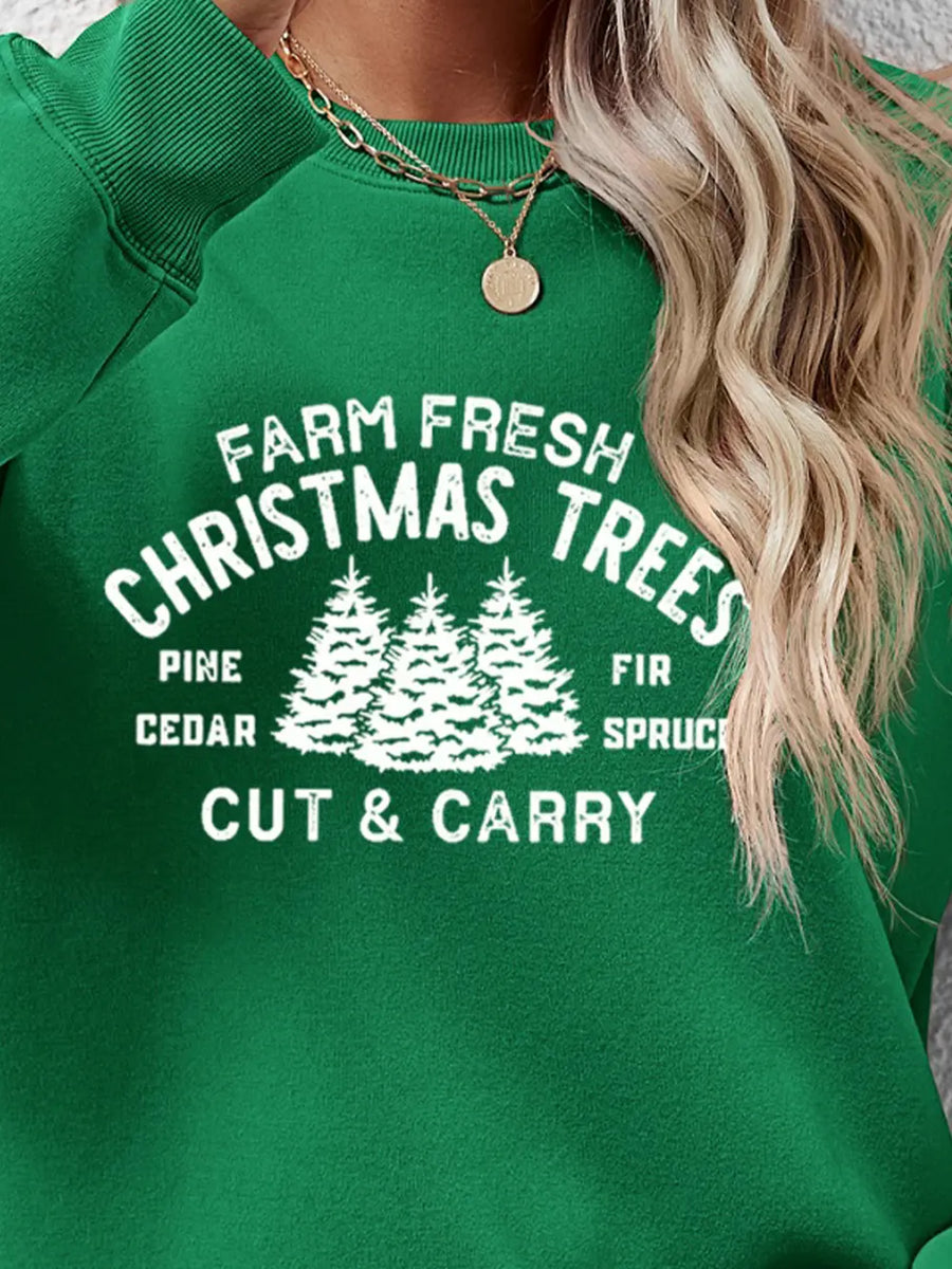 Green crewneck sweatshirt with Farm Fresh Christmas Trees graphic print