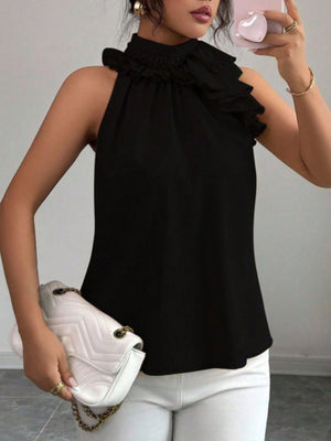 Black ruffled high neck sleeveless blouse with tiered ruffle detail on shoulder.