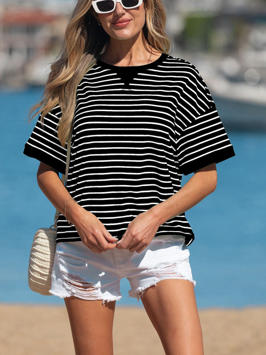 Black and white striped ribbed half sleeve tee with crew neck and boxy fit.