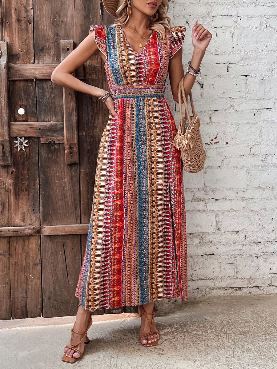 Bohemian maxi dress with ruffle sleeves, V-neck, and colorful ethnic print.