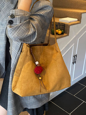 tote in camel featuring large capacity and boxy fit