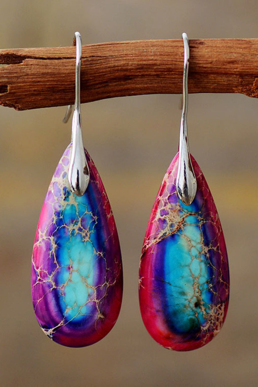 Teardrop jasper drop earrings in gold/multi with vibrant blue, pink, and purple swirls.