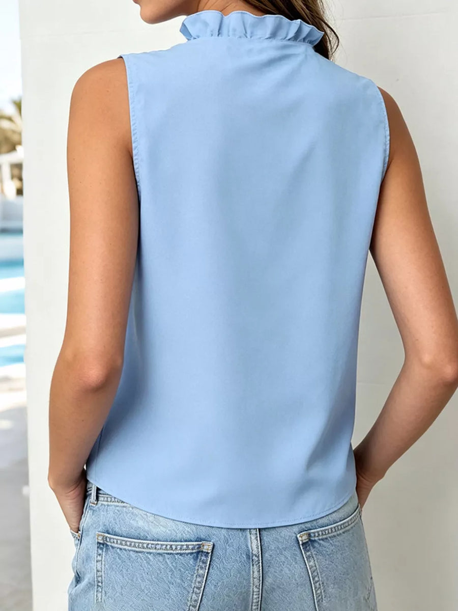 Light blue sleeveless ruffle v-neck blouse with buttoned front