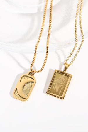 18K gold-plated necklaces with celestial sun and moon charms.
