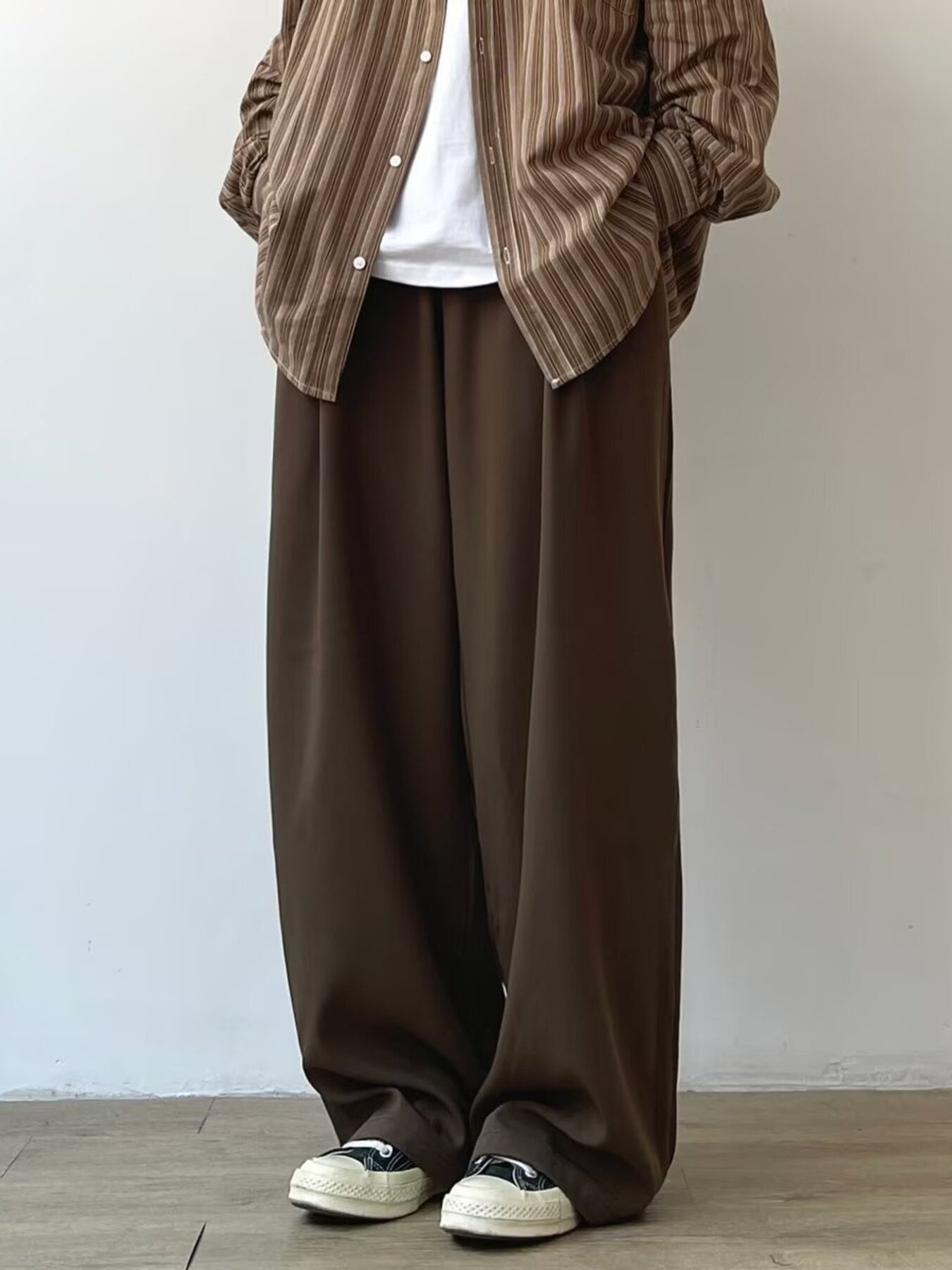 Men's chocolate relaxed fit flowy sweatpants with wide leg and elastic waist.