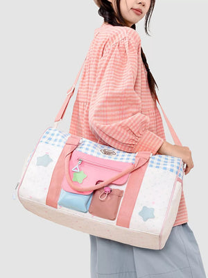 Charming Color Block Travel Bag with multiple pockets and star details.