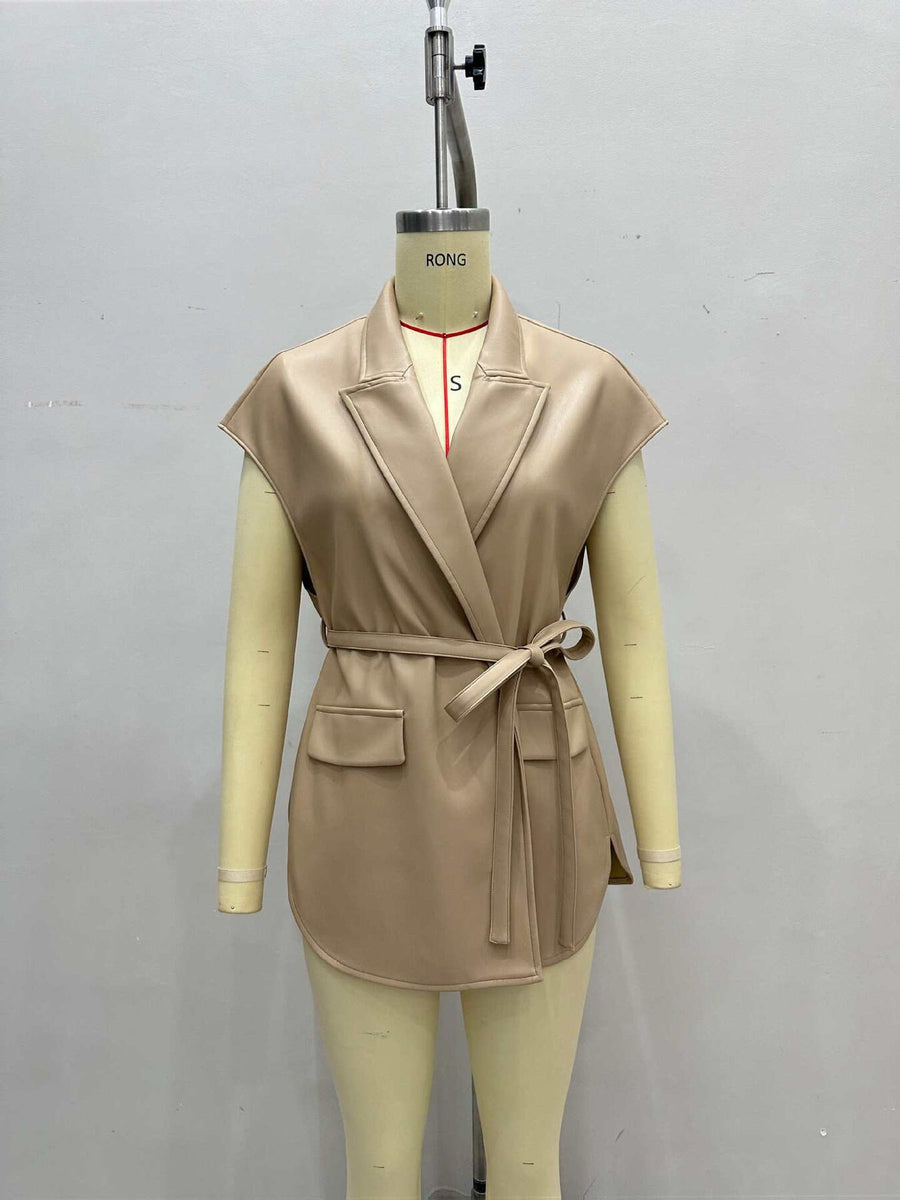 vest in black with belted and hip-length