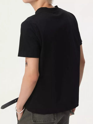 Black cotton blend t-shirt with short sleeves and a mock neck, styled with a bracelet.