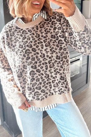 52% viscose, 26% polyester, 22% polyamide Care instructions: Machine wash cold crewneck sweater in Brown with relaxed