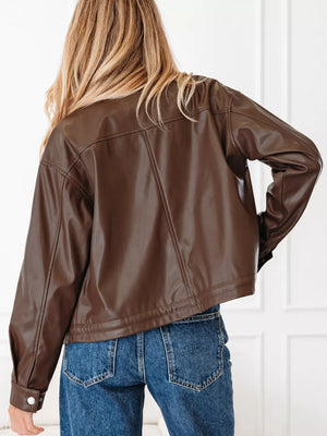 shell:100% PU Lining: 100% polyester Care instructions: Machine wash cold leather jacket in chocolate brown with relaxed