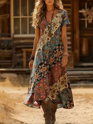 Bohemian patchwork midi dress with V-neck and short sleeves, made of 100% polyester.