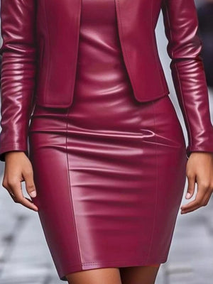 Burgundy leather jacket dress set with fitted skirt and long sleeves.