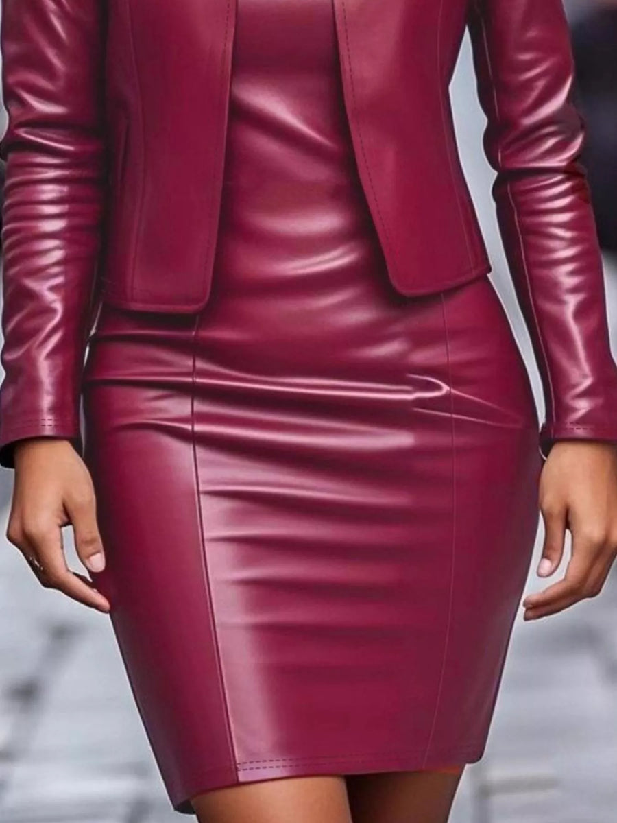 Burgundy leather jacket dress set with fitted skirt and long sleeves.