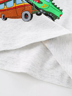 Light grey cotton t-shirt with a whimsical vehicle and dinosaur print.