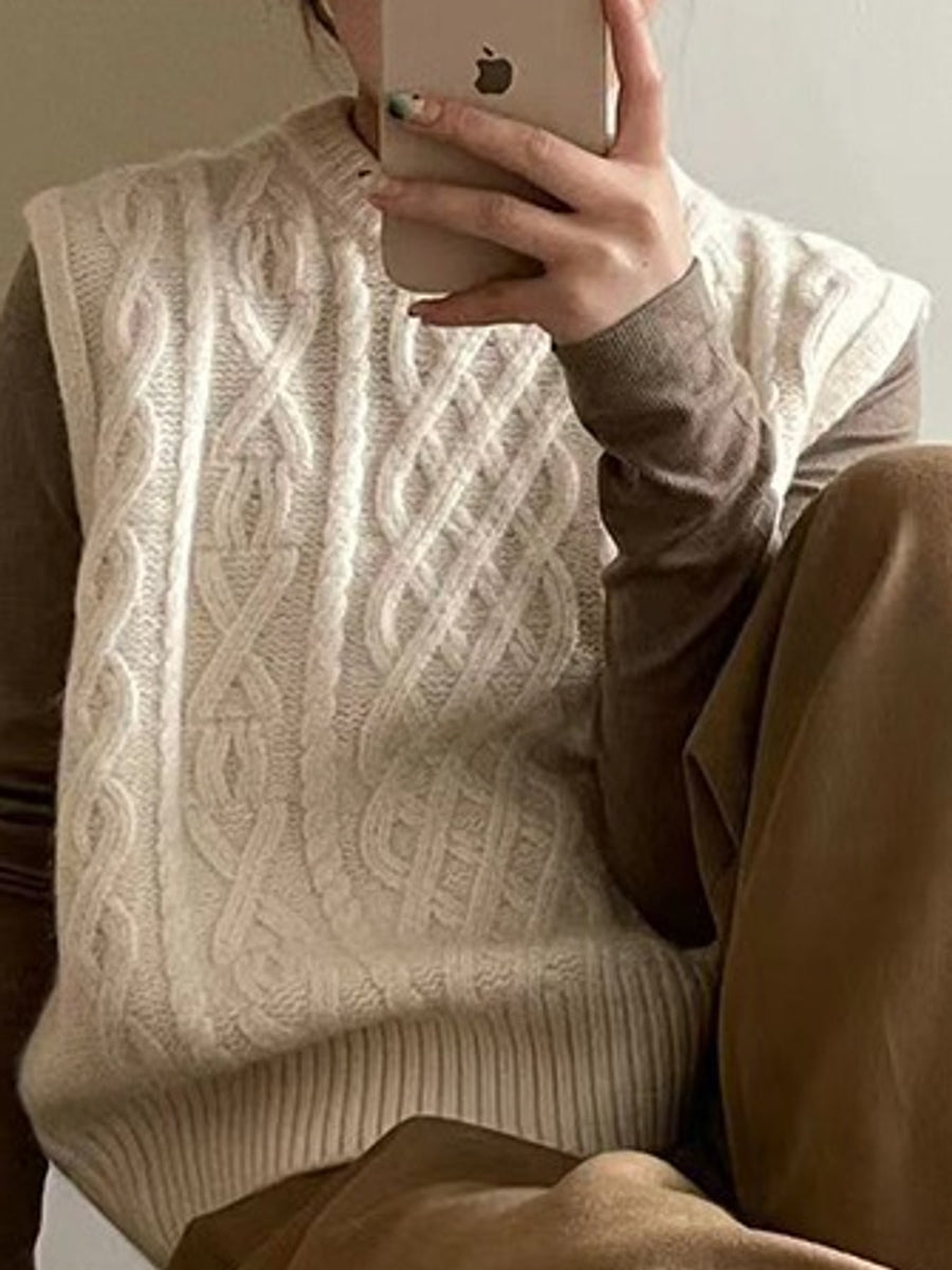 Gray sweater vest featuring cable-knit and cable knit