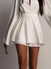 100% polyester Care instructions: Machine wash cold mini dress in Tan with fit-and-flare silhouette