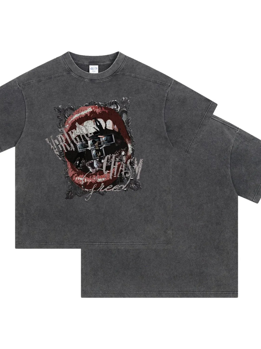Graphic print washed cotton tee in dark gray with a bold lip graphic and text.