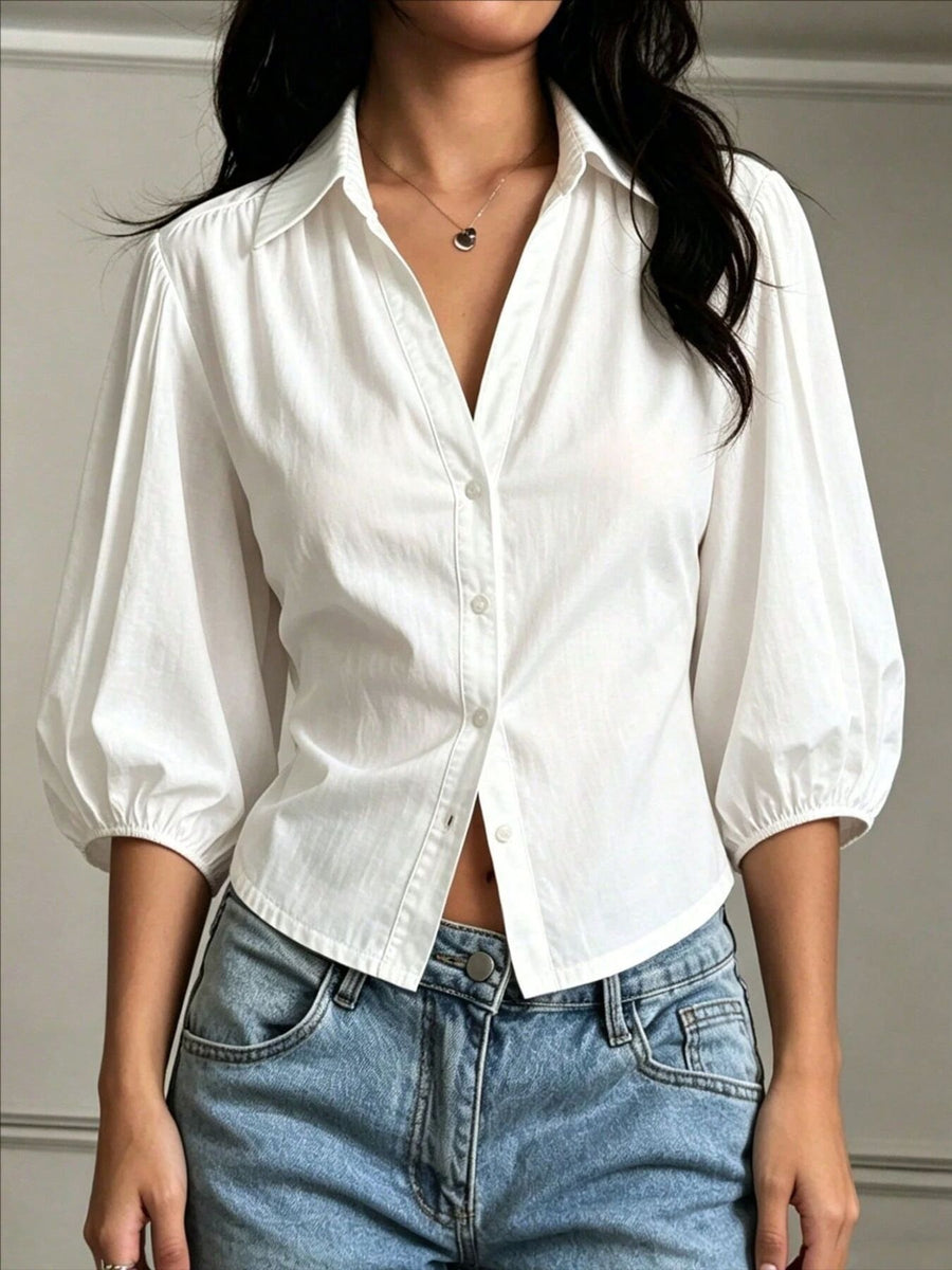 100% polyester Care instructions: Machine wash cold button-down shirt in White with relaxed silhouette