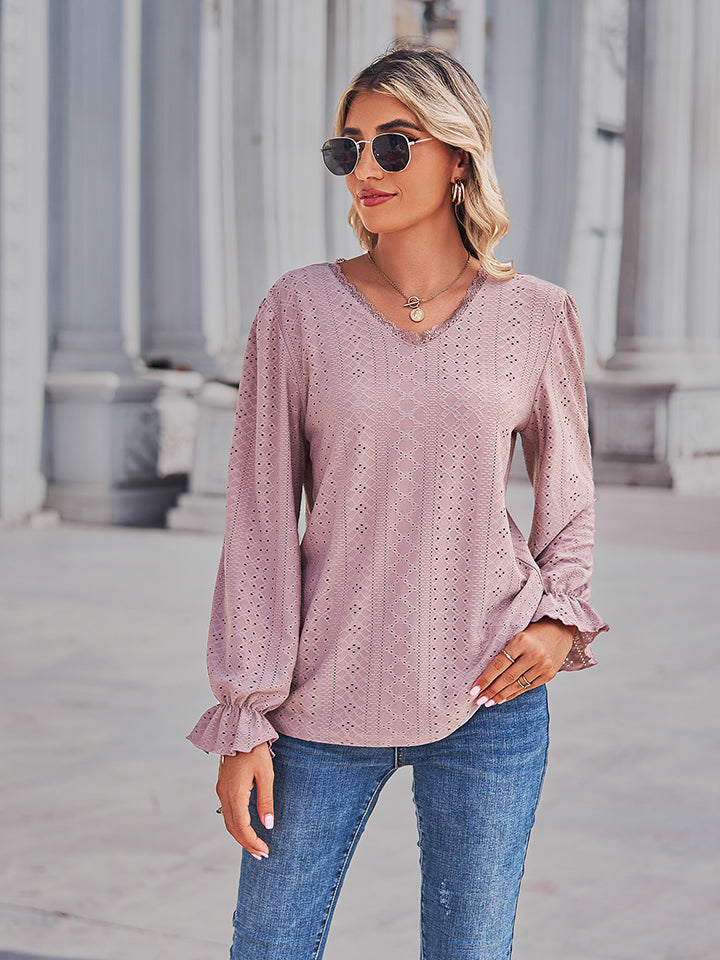 Blush pink lace-cut prairie blouse with ruffled sleeves and V-neck