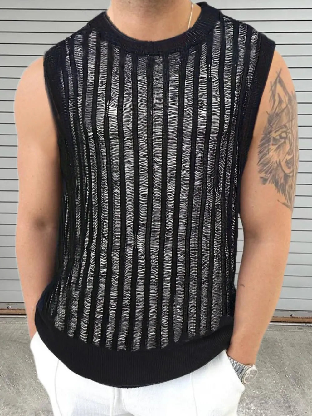 Black textured stripe knit tank top with a crew neck and sleeveless design.
