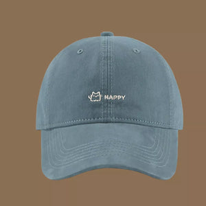 Mist blue cotton baseball hat with embroidered cat and happy graphic