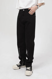 Black relaxed fit denim jeans with zip hem detail