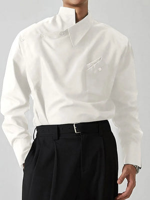 White asymmetric button-up shirt with architectural collar and chest pocket.