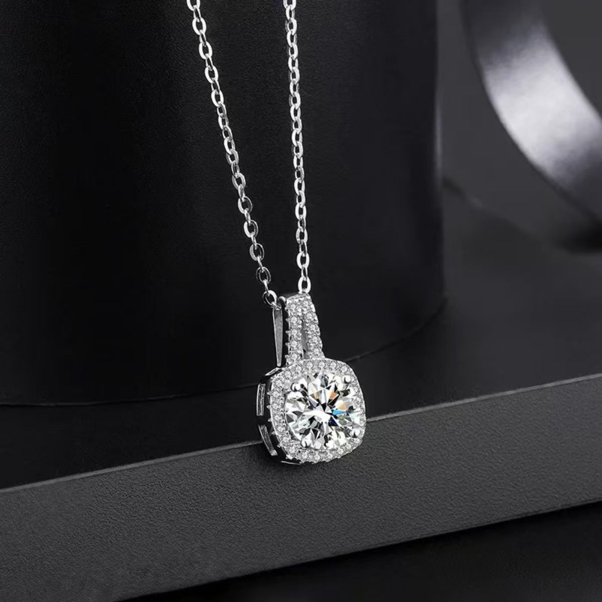 925 sterling silver,Moissanite Carat weight: 1ct Care instructions: Avoid wearin necklace in clear with square silhouette