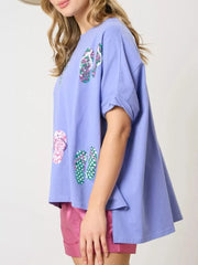 Blue polyester t-shirt with flip-flop print and rolled sleeves