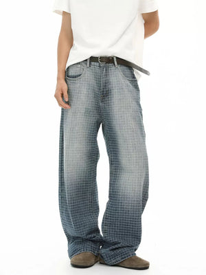 Men's relaxed-fit jeans in blue plaid cotton with a buttoned closure.
